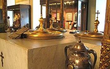 https://upload.wikimedia.org/wikipedia/commons/thumb/7/79/Stove_for_chrism_detail.jpg/250px-Stove_for_chrism_detail.jpg
